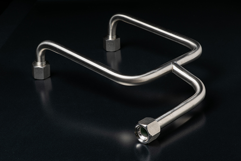 MFC formed stainless-steel tube assembly with a branch — manufacturer assembly example; dimensions and fitting design are drawing-specific.