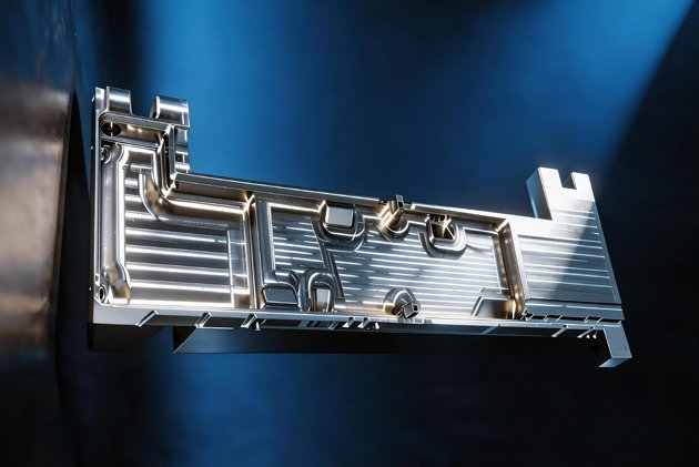 Xindaaitech cold-plate assembly example — installed tubing path and mounting details; no thermal rating is inferred from appearance.
