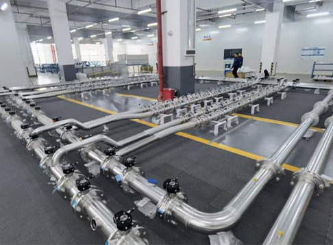 Haobo liquid-cooling piping page reference — prefabricated pipe network and valve arrangement; supplier context image, not our factory or installation.