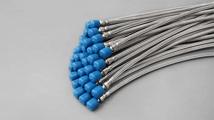 FITOK MH/MM/MX metal flexible hose series showing braided hose bodies and protected ends.