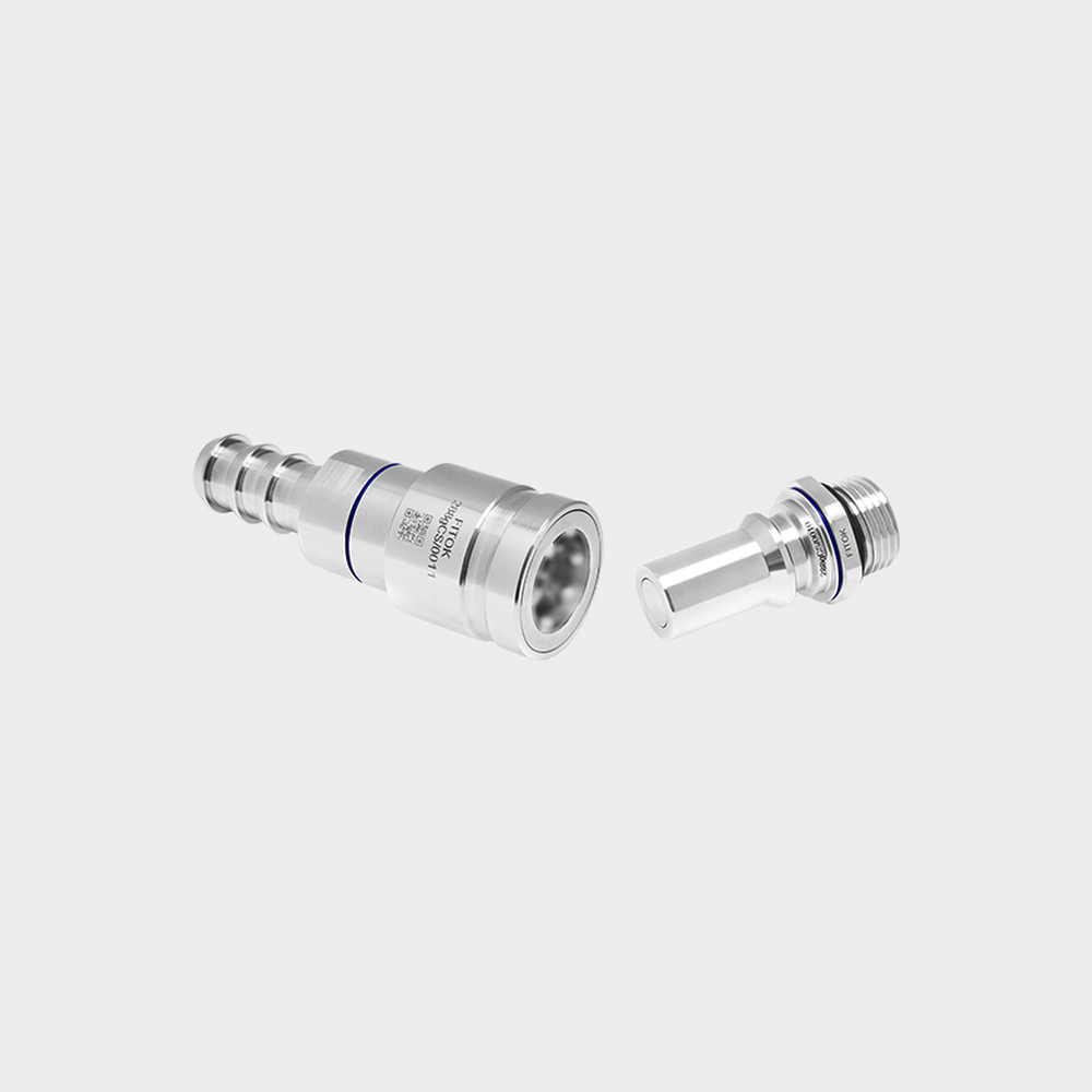 FITOK UQD series socket and plug — manufacturer product illustration showing hose-barb and threaded ends; dimensional and pressure data remain configuration-specific.